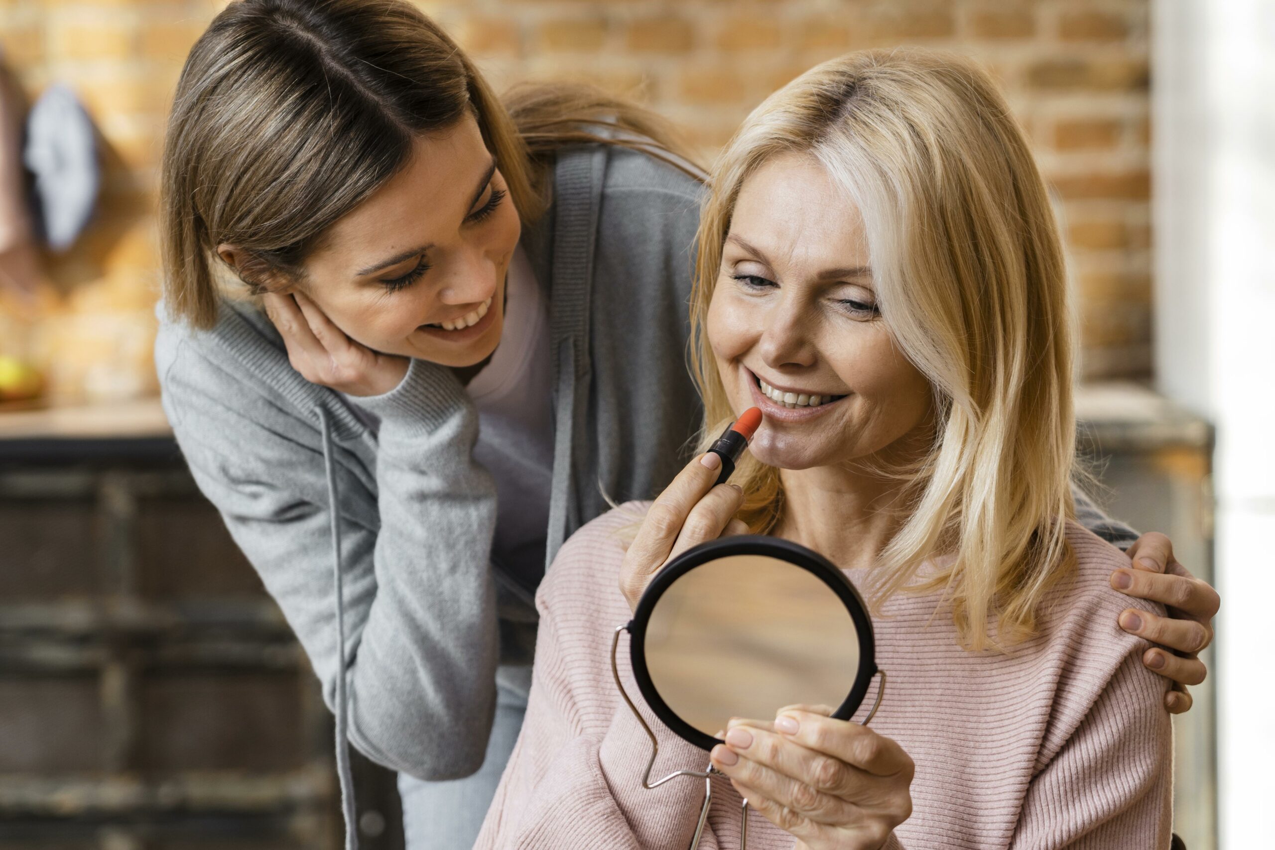 two-women-getting-their-make-up-home